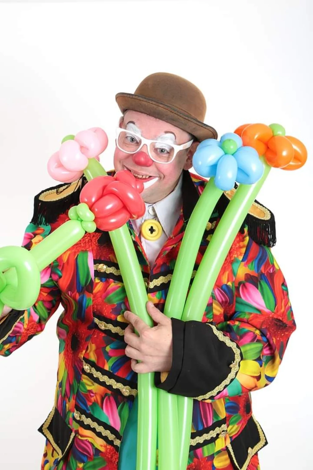 Clown Spekkie met meerdere kleurrijke ballonfiguren